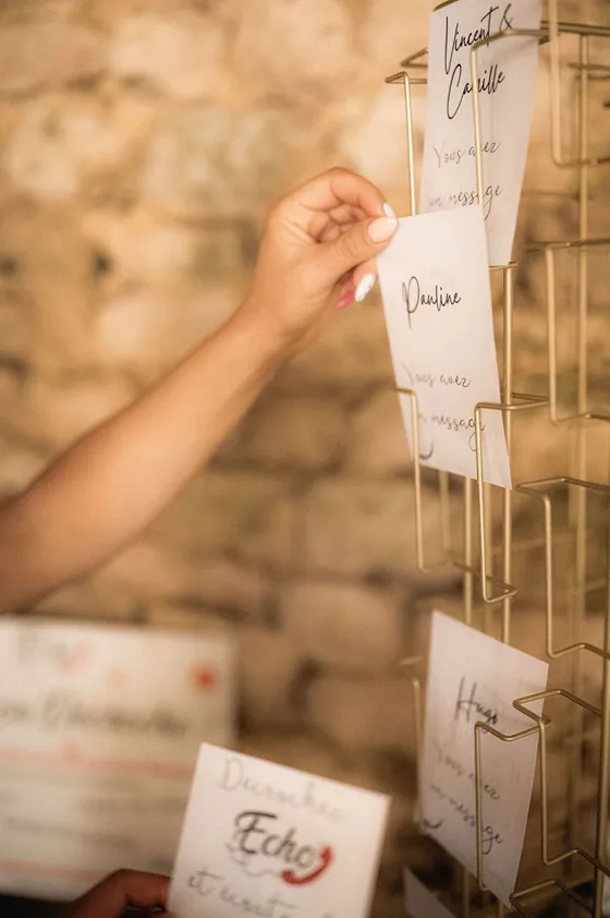 A guest hangs up her message card